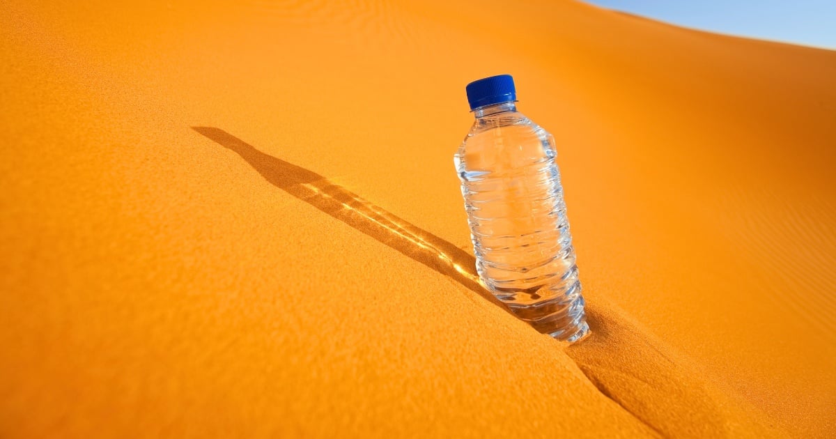 bottle of water in the dunes